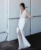 Bröllopsklänning 2023 Sexig arabisk sjöjungfru klänningar Illusion Deep V Neck långärmad sida delad bohemiska brudklänningar Vestidos de novia