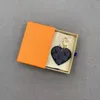 Brand Classic Luxury Keychain Heart Shape Brand Brown Black Flower Diseñador Carpintería para mujeres Fibbia Keychain