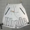 2023 Designer Men Summer New Men's Shorts Rhude Lettre réflexive Impression de rue Street Mens Sports Casual Beach Short