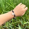 Bileklik Erkekler Meditasyon Buda Lotus Charm Siyah Volkanik Kaya Boncuklar Elastik Boncuklu Strand Bilezikler Boğaz Çakra Manevi Retro Bracelbangl