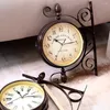壁の時計素晴らしい黄褐色の時計ヨーロッパスタイルの装飾的なバッテリー操作ミュート飾りの細かい仕上がり