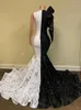 Party Dresses Designer Mermaid Prom Lace Appliced ​​paljetter Långärmad aftonklänning 2023 Svartvita illusionsklänningar