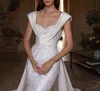 Abiti da sposa eleganti a sirena Senza maniche Scollo a cuore Applicazioni in raso Paillettes In rilievo Lunghezza al pavimento Treno staccabile Taglie forti Abiti da sposa eleganti Abiti da sposa