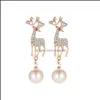 Stud Stud Navidad Elk Pendientes de diamantes Temperamento Coreano Lindo Pequeños animales Pendiente de perla Clip de oreja Ciervo ajustable Entrega de gota Joya Dhync 299y