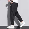 Męskie dżinsy mężczyźni 2023 Wiosna latem Tide Brand Bawełna męska luźna trend Koreańska wersja spodnie czarne harem