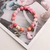 Braccialetti con ciondoli Bracciale con perline colorate fai da te in stile Sisi rosa per le donne Ciondolo con nappa a forma di cuore con libellula Gioielli da donna Donna