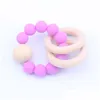 SOOTHERS TETESERS BABY TEELRINGS FOOD GRADE BEECH WOOD TEING RING RING RING TOYS SHOWER PLAY ROUND WOODS WOODS BEAD新生児SILE 826 DHMXE