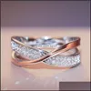 Con piedras laterales Anillo cruzado en forma de X de dos tonos frescos para boda femenina Joyería de moda Impresionante piedra Cz Anillos grandes y modernos Drop D Dhxjc