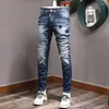 Jeans da uomo alla moda High Street Beggar Patch Foro al ginocchio Industria pesante Lavaggio Pantaloni da uomo anziano Piedi sottili Matita denim giovanile