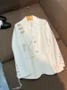 2023 Спринг-белые сплошные цветные цепи пиджаки с длинным рукавом с зарезанными яростными оболочками.