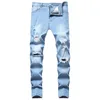 Jeans da uomo 2023 Primavera piedi piccoli Pantaloni azzurri con foro al ginocchio Pantaloni da uomo slim fit Tempo libero Streetwear Hip Hop Uomo