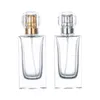 50mlパッキング空の香水ガラスボトルスクエアシェイプゴールドシルバースパリアプレスポンプ付きポータブル補充可能な化粧品パッケージングコンテナ