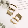 Stud Luksusowe projektanci stadningi dla kobiet 18K Gold PlATED CEARRING EAR STUD PROJEKTER MARKA LITET METAL BAG Geometryczne kobiety Wedding Party Prezent