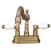 Torneiras de pia do banheiro Antique Brass 4 "Centetset Dois buracos Bacia Torneira Misturador de Tap Swivel Spout Double Ceramic Leavas Mnf326