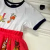 23ss designer sommarmode tjejer Tryck kjol skjorta set bomull t-shirt tvådelad kostym märkeslogotyp barn klänning skjortor kostymer Babykläder album a1