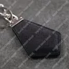 Unisex nyckelringar herr designer nyckelring mode nyckelringar f￶r kvinna svart l￤der lyxiga nyckelkedjor lanyards bil nyckel ringv￤ska charm