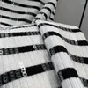 Rokken klassiek chic pailletten zwart en wit interstrip gebreide slanke halve rok vroeg voorjaarsproduct 2023