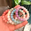 Imitation bodhi bracelet key chain with soft fingers, gradual blue peach, pink couple style, students' ice-through handheld stationery chain