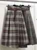 Signe 2023 Autumn Women Plaid Plaid in lana irregolare Midi Pieghe Midi Sashes Inghilterra Vintage Warm A-Long Skirt Faldas Mujer Moda