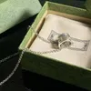 Colliers de pendentifs vintage pour hommes des femmes concepteurs bronze en or joels bijoux g diamant amour perle fête collier 2bb