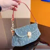 Дизайнерские женщины мини -милая джинсовая сумка для плеча Франция роскошная бренда L монограммы цветы с печено