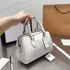 Bolsos Totes Bolso Bolso de diseñador Mujer Clásico Imitación Marca Costura Letra Cremallera Flor Solo hombro Bolsa de almohada Versátil Fiesta de viaje Cena Monedero