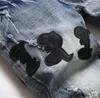 Erkekler kot pantolon Avrupa denim erkek mektubu yıldızı erkekler nakış dikişi gözyaşı trend marka motosiklet pantolonlar erkekler ince yırtık kot eğilimi elastik ince ince ince küçük ayak pantolon