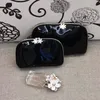 Women Snowflake PU Caseup Case 3pcs مجموعة الغرور مستحضرات التجميل التجميلية الماكياج منظم الأزياء حقيبة القابض BOUTIQUE218F