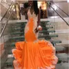 2023 Sexy Prom Kleider Orange Neckholder Spitzen Applikationen Kristallperlen Rückenfreier Meerjungfrau Abendpartykleider Spezielle Anlass tragen GJ0217