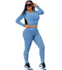 Tracksuits voor dames 2023 Designer merk comforthulsport 2 -stuk yoga gym t -shirt broek met lange mouwen