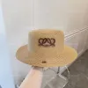 Chapeau de luxe classique Concepteur de chapeau à large bord Tresse d'herbe Pare-soleil plat