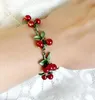 Braccialetti con ciondoli CSxjd 2023 Bracciale vintage gioielli imitazione perla mirtillo rosso vernice catena di metallo moda elegante gioielli donnafascino