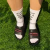 Au détail hommes et femmes pantoufles EVA diapositives couple sandales imperméables chaussures