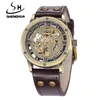 Polshorloges mode vintage bronzen horloge mannen skelet kijken naar shenhua full staal automatisch mechanisch reloj hombre montre hommewristwatches