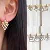 Boucles d'oreilles créoles HECHENG 4 styles 1 paire Triangle circulaire carré étoile Double face géométrie suspendue brillant CZ pour les femmes en gros