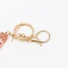 سلاسل المفاتيح A-Z Flroal keychain keychain keychain key-key chain car keyyring اسم بسيط الاستمتاع DIY المجوهرات GiftKeychains