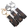 Créativité Presbyopie Car Keychain Sac Pendant Pendre Bijoux de bijoux Posteur pour hommes Gift Fashion Pu Leather Glow Design Metal Chain Chain Accessoires