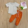 Kledingsets Lioraitiin 0-24m geboren baby Baby Boy Girl Summer Clothing 2pcs set korte mouw solide top shirt lange broek outfit 230217