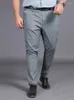 メンズパンツ2023夏の薄いズボンの男性脂肪の大きなヤードルーズロングパンツビジネスマイクロエラスティックトールウエストソリッドカラー男性服