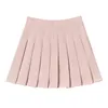 Kjolar vår sommarkoreanska kjol shorts kvinnor hög midja sexig mini kjol skola kort veckad kawaii japansk rosa kjol kvinnlig 230217