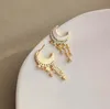 Pendientes de tuerca simples Xingyue Metal de gama alta viento frío señoras moda joyería de temperamento que combina con todo