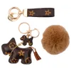 Gros mignon chien conception voiture porte-clés sac pendentif charme bijoux fleur porte-clés femmes hommes cadeaux mode PU cuir animaux porte-clés accessoires