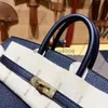 10A حقيبة اليد اليدوية حقيبة فاخرة Togo Digner Handbags العلامات التجارية الكلاسيكية الموضة المرأة محفظة البقر جلد البوتشيت القابض مع المختلط الأصلي ببوين ذبابة