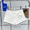 Designer de jeans feminino pequeno shorts de jeans brancos perfumados com cintura alta e calças retas altas para mulheres no verão PE90