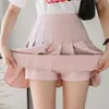 Kjolar vår sommarkoreanska kjol shorts kvinnor hög midja sexig mini kjol skola kort veckad kawaii japansk rosa kjol kvinnlig 230217