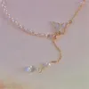 Chaines 2023 Fashion Elegant Imitation Pearl Chain for Women Asymétric Butterfly Choker Ajustement Collier de pendentif Crystal Girls Girls