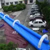Buitenspellen Gigantische opblaasbare dia de stad Lange opblaasbare schuifslip Zomerwaterglijbaan voor hotday feestevenementen