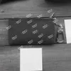 Bolsa -chave 62650 Designer de Pochette Mini Men Men Men Principal Titular do cart￣o de cr￩dito Coin Purse Mini Wallet Bag Charm Pochette Acessorie2782