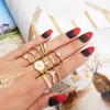 Ohrstecker Bohemian Creative Dripping Oil Complex Personality Trend Black-eyed Snake Star Pearl 11-teiliger Set Ring