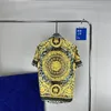 Mężczyźni designerskie koszule Summer Shoort Sleeve Casualne koszule moda luźna polo w stylu plażowym oddychając Tshirts Tees Ubranie #562736